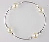 The original Slossy Slide!
Swarovski Pearl & Sterling Silver Tube Stretch Bracelet